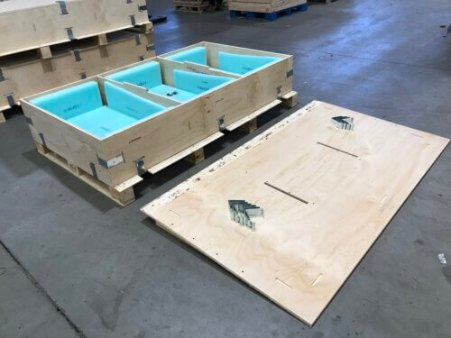 An opened EZ Loc Crate, showing custom design and internal dunnage