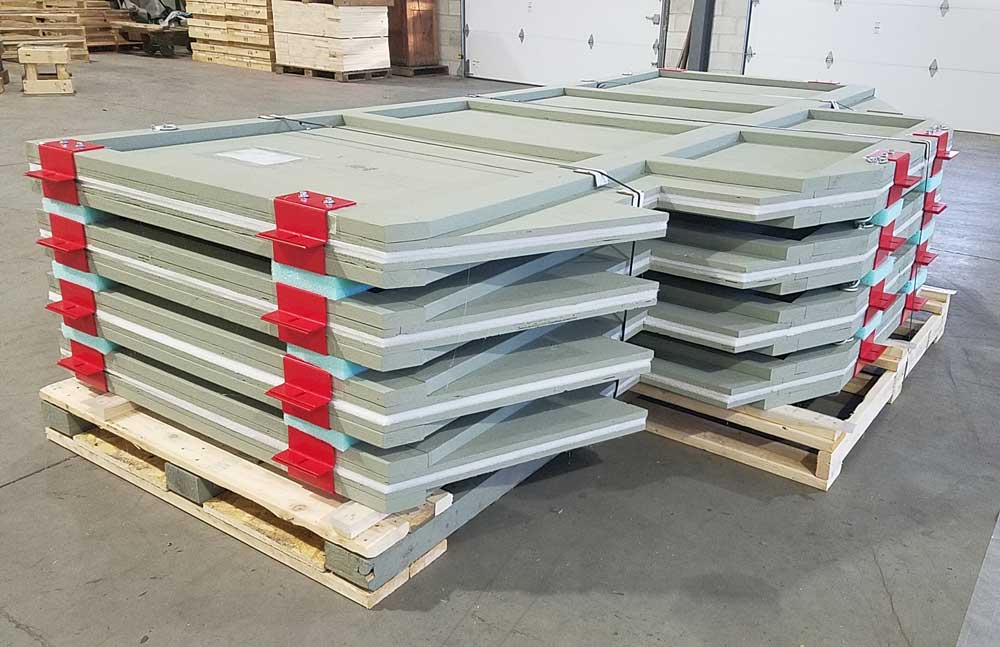 Disassembled wood/steel packaging broken down for transport.