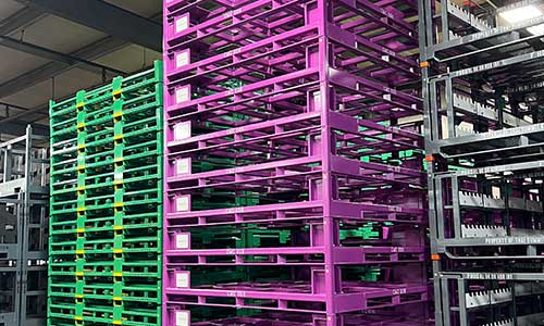 Colorful stacks of steel racks in a warehouse.